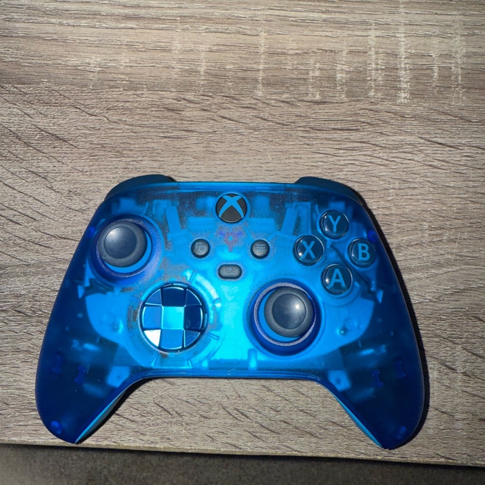 Blue Metallic Xbox Controllers with Custom Designs